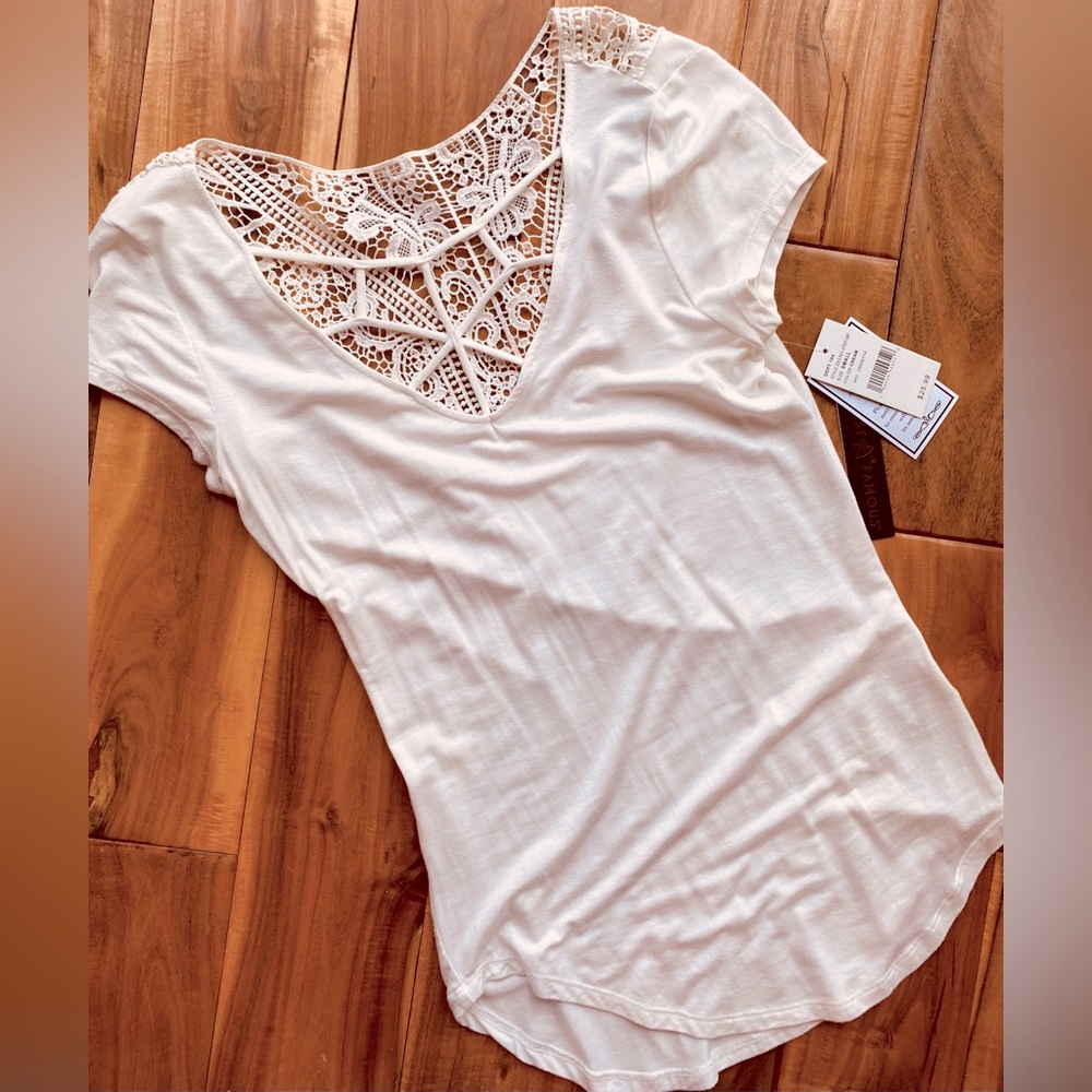 NWT Almost Famous top. Lace cut-out details.